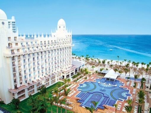 Aerial view of Hotel Riu Aruba, blue ocean can be seen in the background.