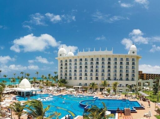 Pool view and blue sky at Riu Palace in Aruba in the Caribbean.