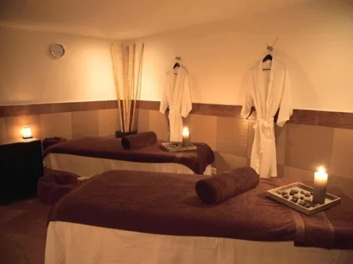 interior view with bathrobes and candles at the spa in the Riu Palace Hotel in Aruba.