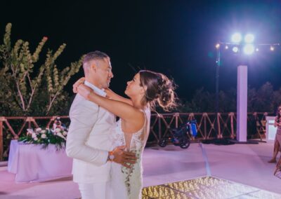 couple Shawn and Courtney dancing at their wedding reception at their hotel resort.